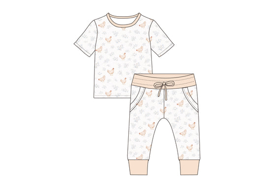 Children's pajama set with chicken pattern on a white background